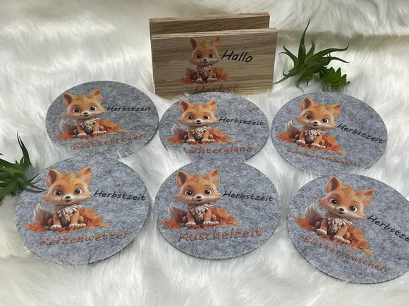 Filzuntersetzer mit „Lichterglanz“-Spruch auf grauem Filz