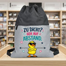 Grauer Sportbeutel mit Cartoon-Ente und modernem buntem Schriftzug für Jugendliche.