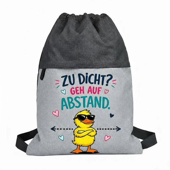Zweifarbiger Gymbag mit frechem Spruch und cooler Sonnenbrillen-Ente als Hingucker.