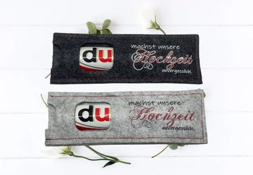 Bedruckte Filzhülle als Gastgeschenk zur Hochzeit mit dem Spruch „machst unsere Hochzeit unvergesslich