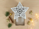 Detailaufnahme der filigranen Lasercut-Muster der Holz-Geschenkbox Sternform