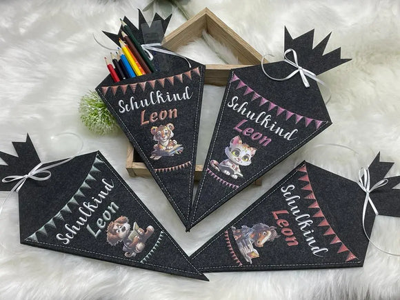 Schultüte mit Namensaufdruck und bunten Wimpeln – liebevoll gestaltetes Einschulungsgeschenk