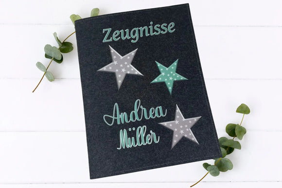 Schlichte Zeugnismappen mit drei sternförmigen Applikationen in Mint, Schwarz und Grau – in zwei Filzfarben erhältlich
