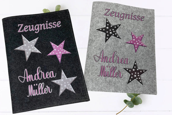 Kinder-Zeugnismappen mit Sternenmuster und individueller Namensaufschrift – in Dunkel- und Hellgrau erhältlich