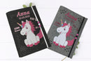 U-Heft-Hülle mit Einhornmotiv, pinker Schweif und Mähne – liebevoll gestaltet für kleine Einhorn-Fans.