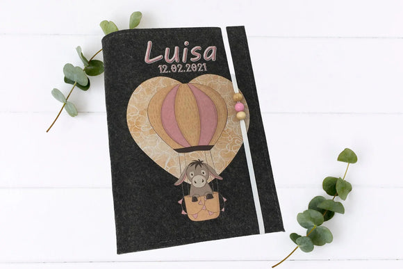 Handgemachte U-Heft-Hülle mit Esel in Luftballon, rosa Beerenperlen und elastischem Gummiband.