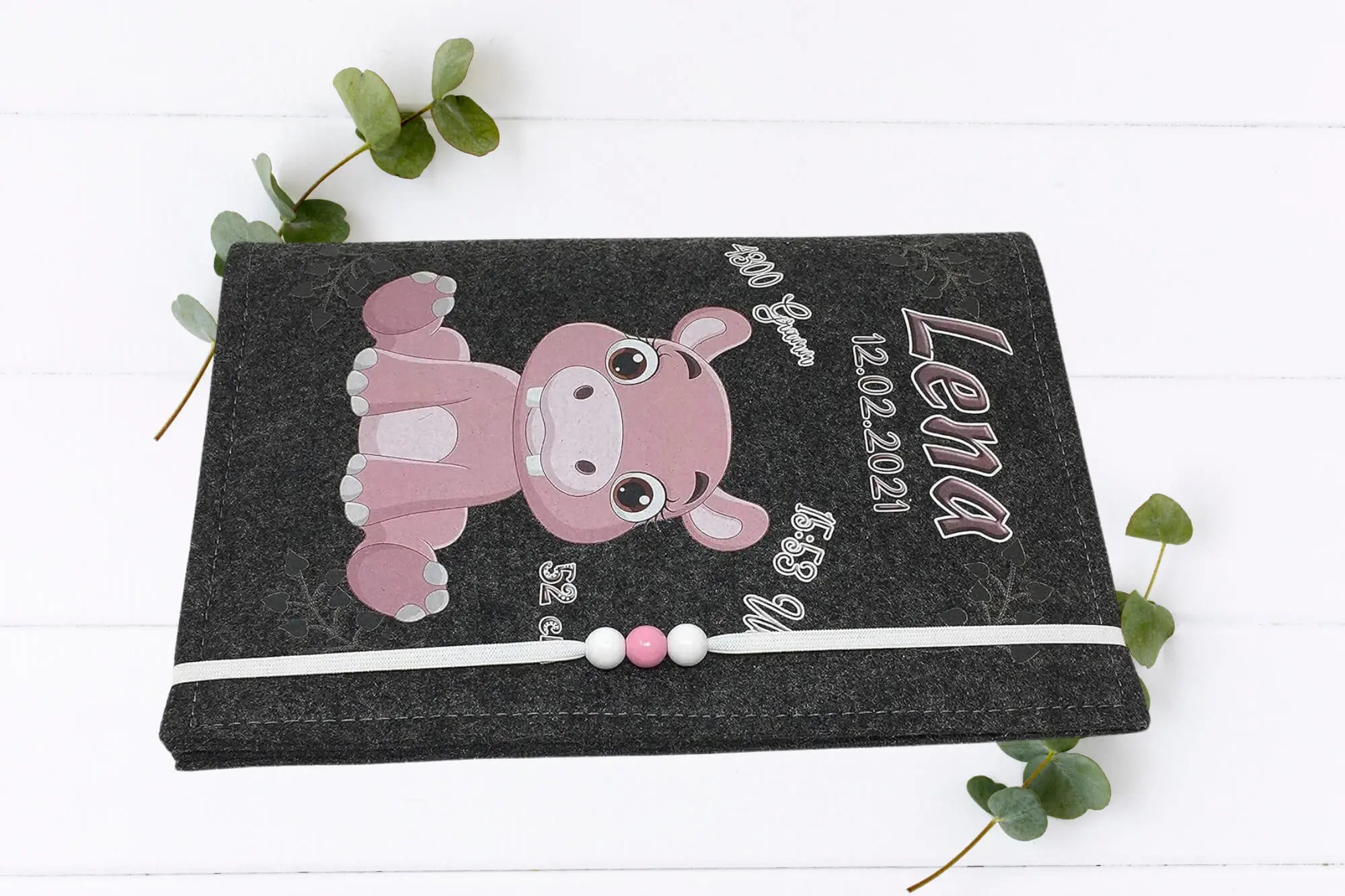 
U-Heft personalisiert mit rosa Hippo