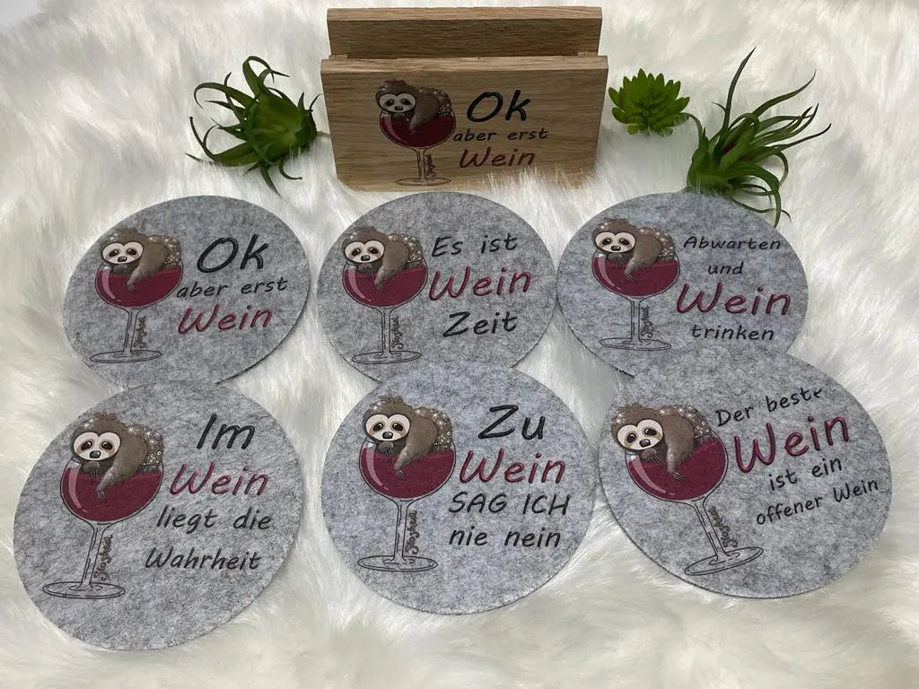Hellgraue und dunkelgraue Weinuntersetzer im Set mit Holzkästchen