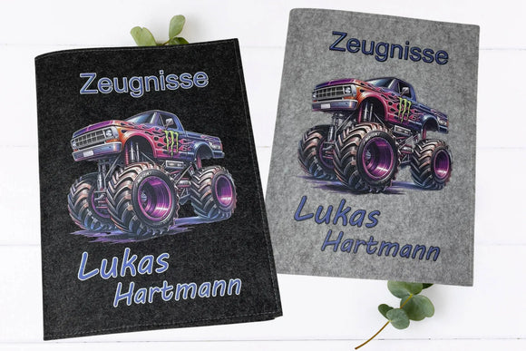 Personalisierte Zeugnismappe mit buntem Monstertruck auf riesigen Reifen – perfekt für Jungen zur Einschulung oder Schuljahresende.
