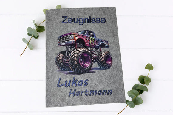 Kinder-Zeugnismappen in Dunkelgrau und Hellgrau mit stylischem Monstertruck, personalisiert mit Vor- und Nachnamen.