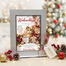 Geld zu Weihnachten verschenken mit Wichtel, Laterne, Tannengrün und Weihnachtssternen