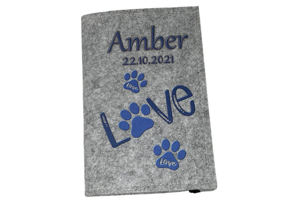 Schöne Geschenkidee für Tierfreunde – Heimtierausweishülle mit blauem Motiv.